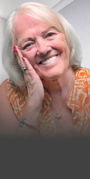 Patient showing a bright, confident smile after dental treatment.