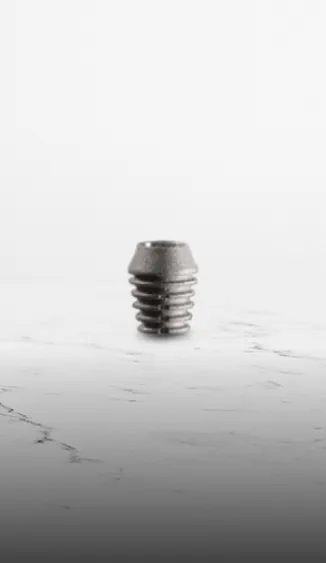 Image of short dental implants, highlighting their compact structure, ideal for areas with limited bone height.